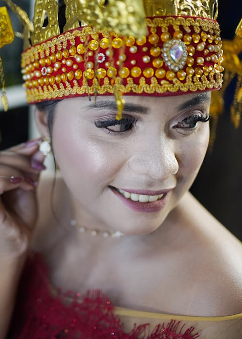 Smiling Woman in Headpiece