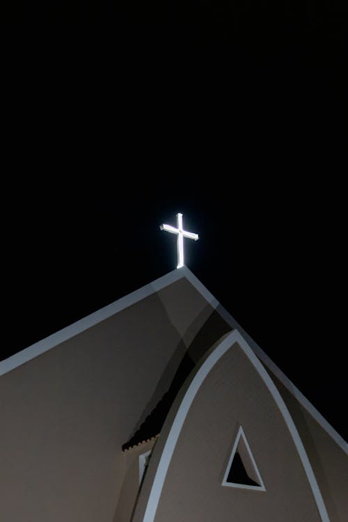 Cross on a Church at Night 