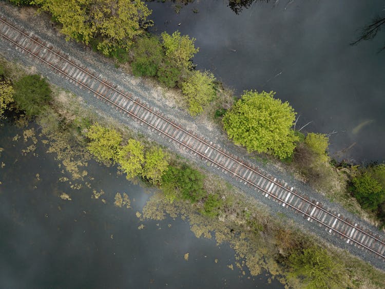 Railway Track And Lake Around