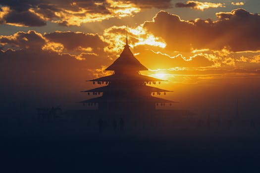 Dramatic silhouette of a pagoda during sunset at Burning Man festival, Nevada.