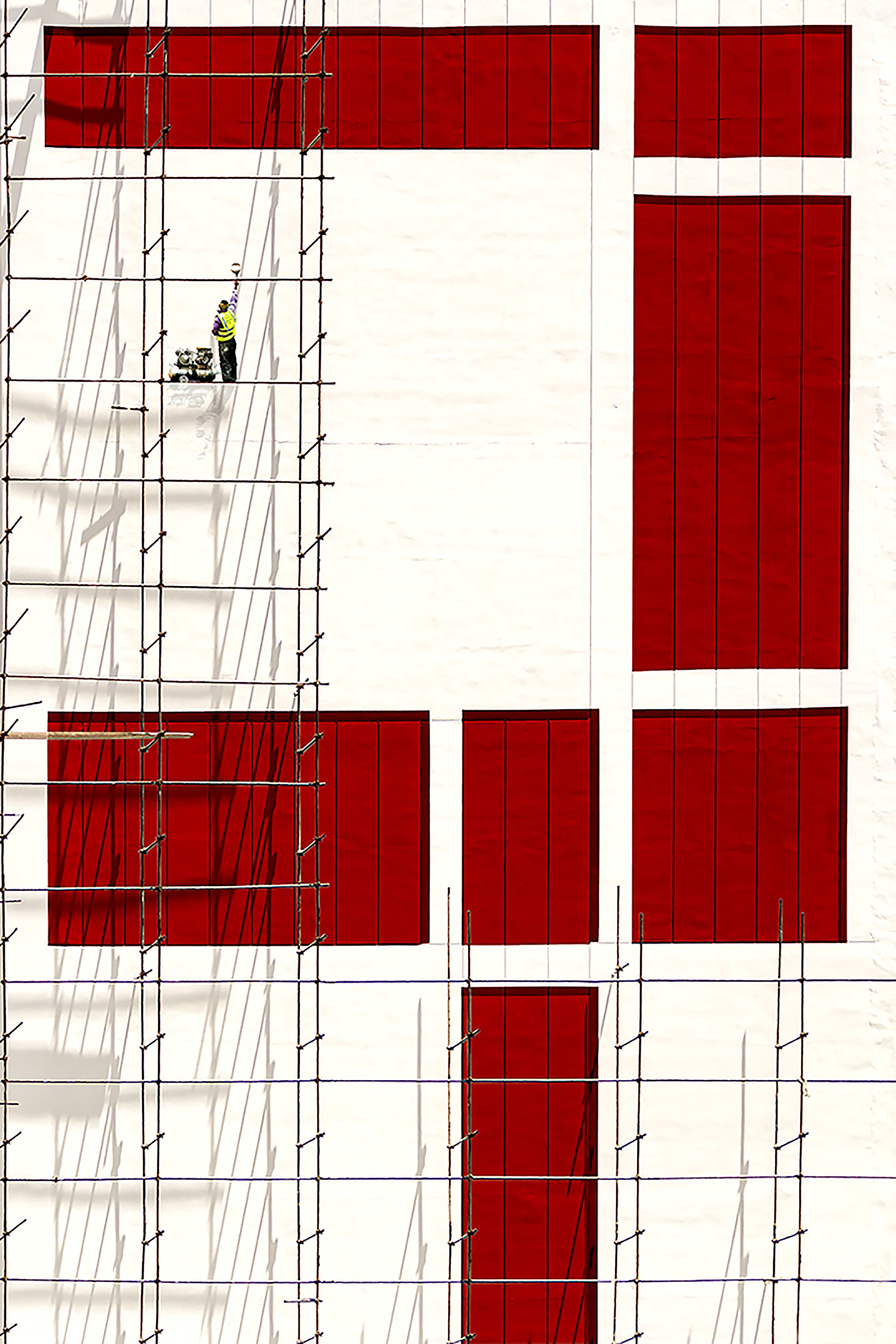 Scaffolding against building facade in Tehran, showcasing ongoing construction.