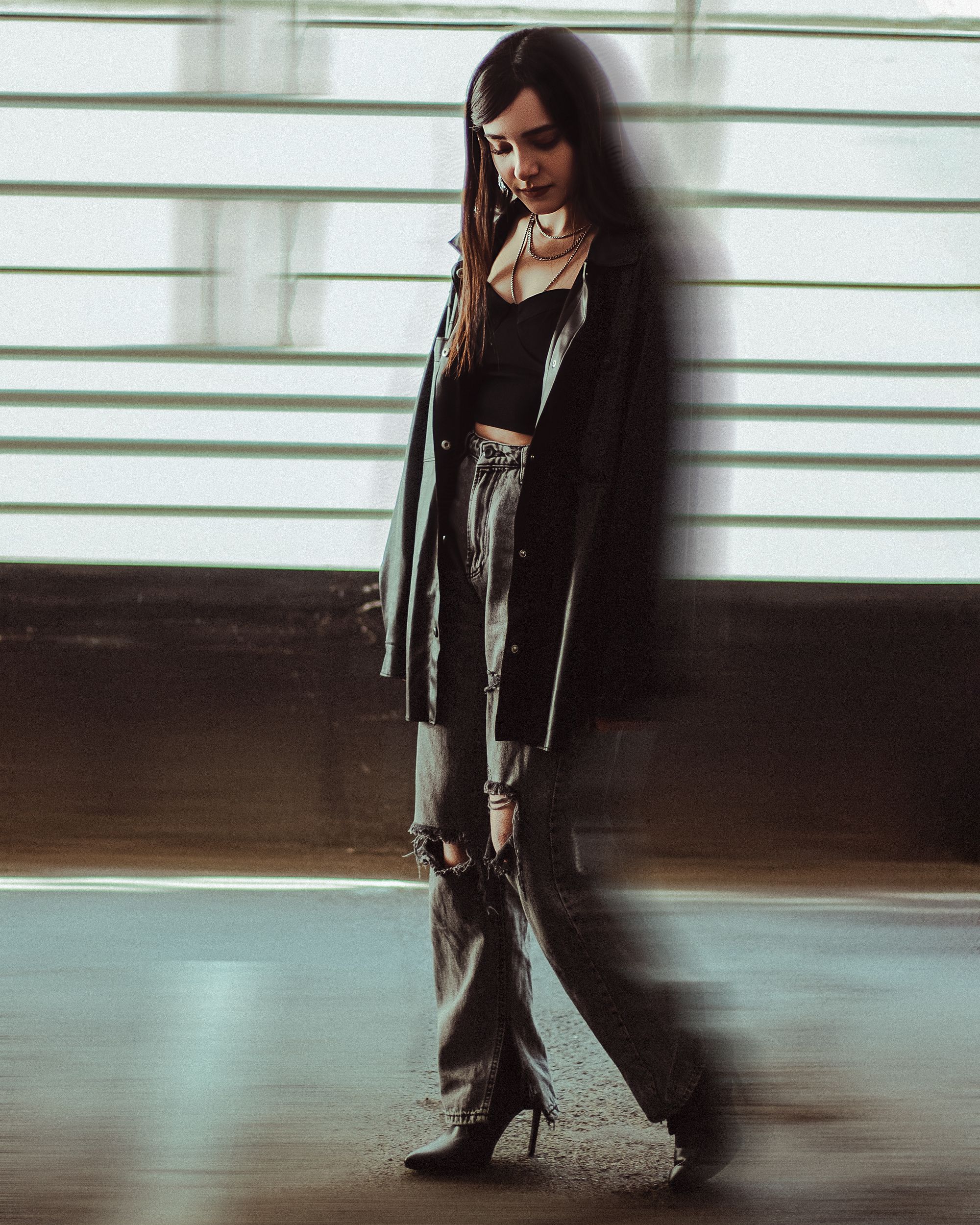 Young Woman in a Leather Jacket and Pants · Free Stock Photo