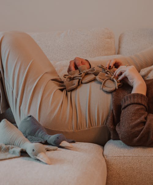 Closeup of a Pregnant Woman Lying on a Sofa