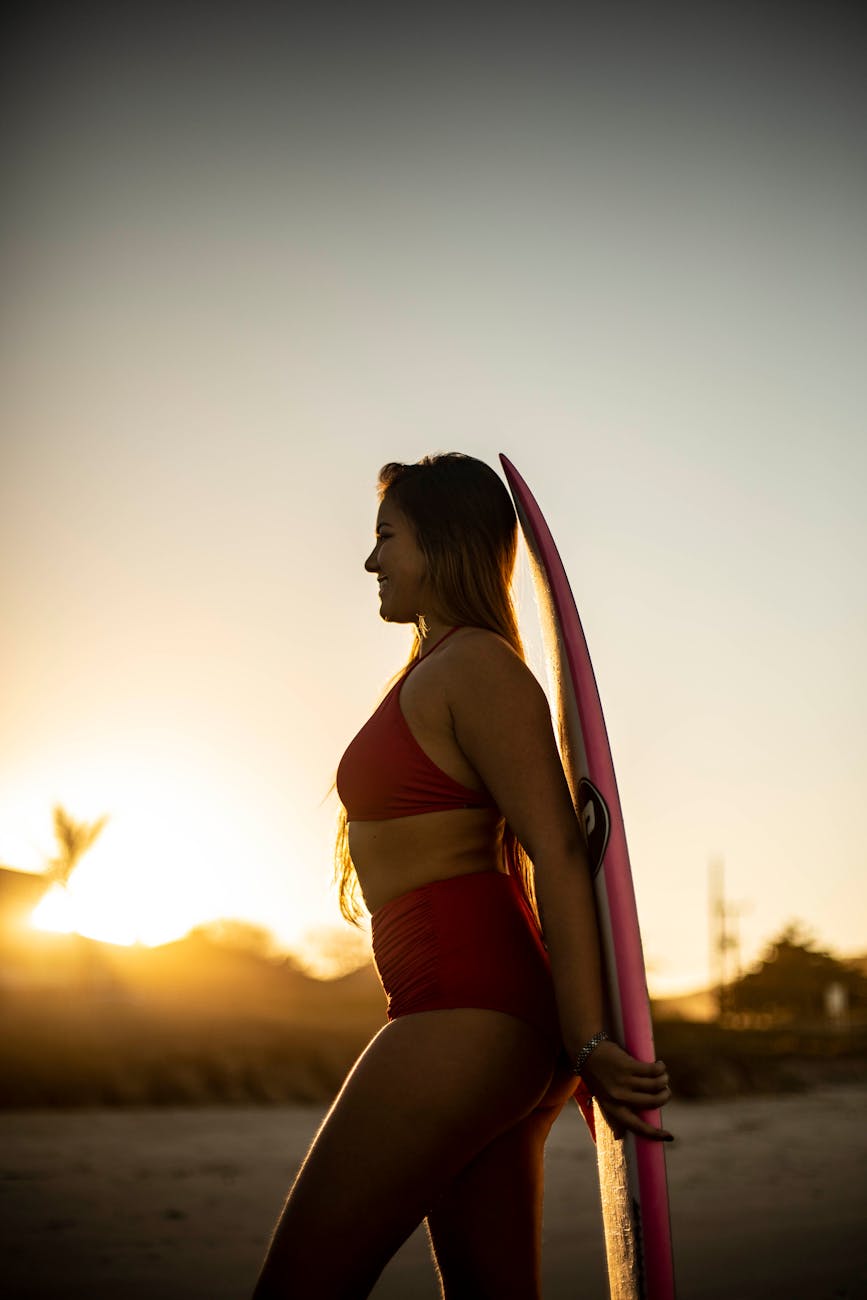Holding a surfboard