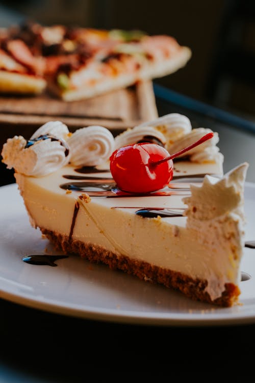 Cheesecake with Cherry on a Plate
