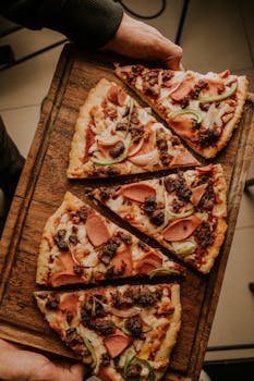 Mouth-watering pizza slices served on a wooden board, showcasing toppings like pepperoni and cheese.