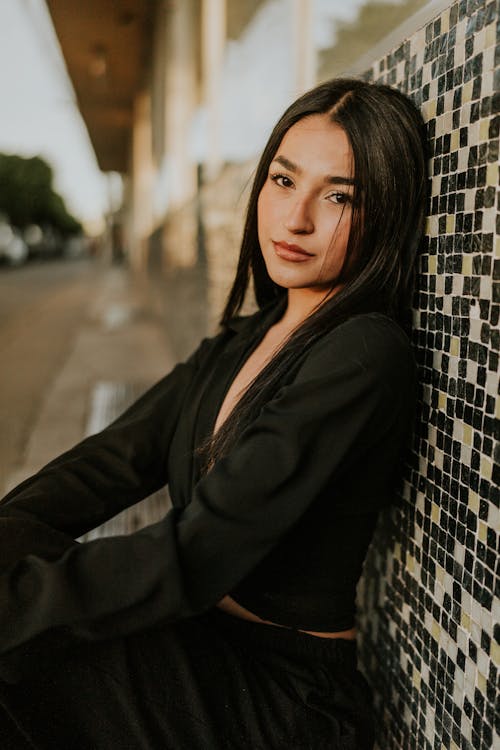 Portrait of Woman Wearing Black Outfit on a Street