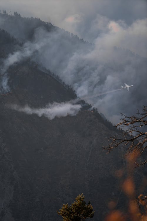 Aircraft in Flight over Mountains