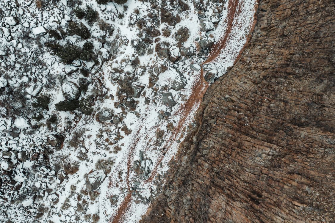 Snow Changes Rocks Snow-Covered Rocks by Mountainside · Free Stock Photo