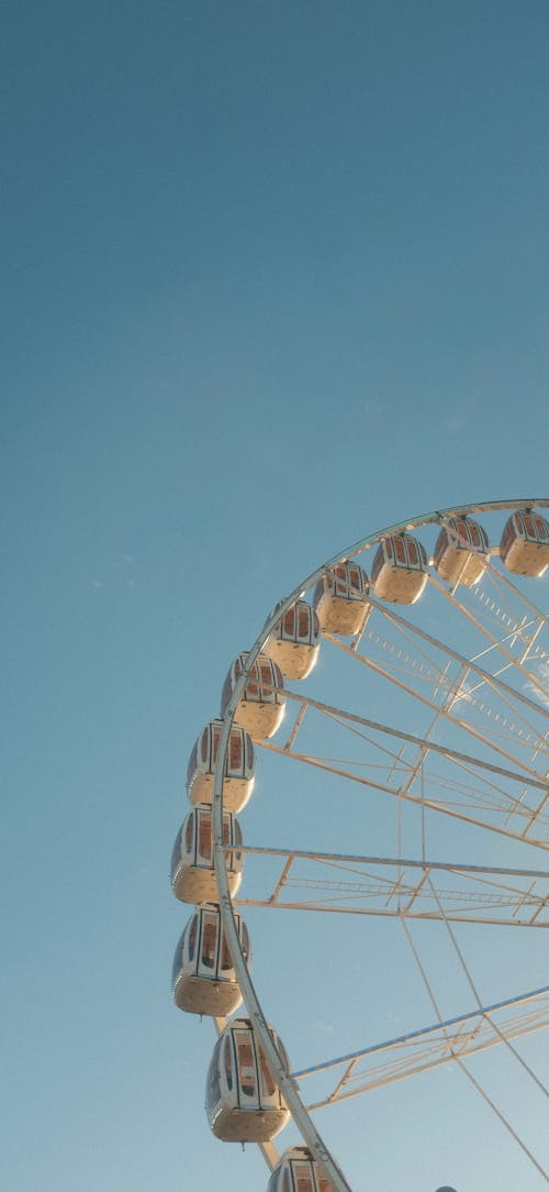 Ferris Wheel Against Blue Sky