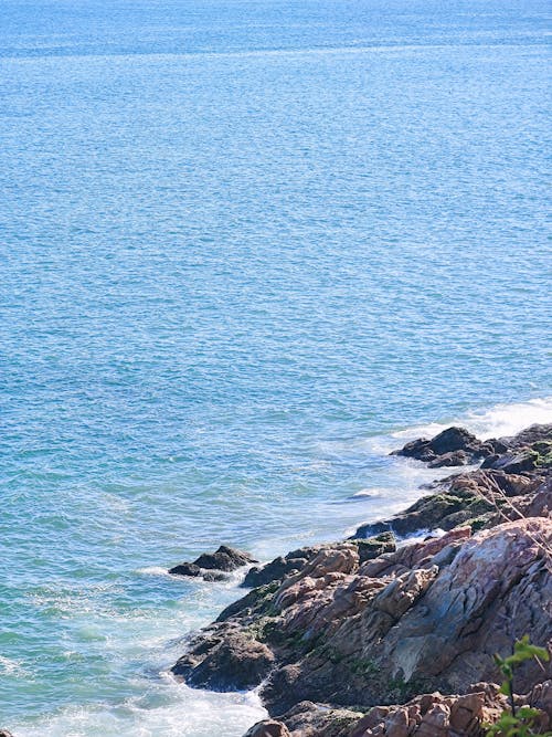 Blue Ocean at the Rocky Shore