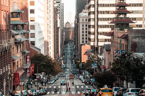 Free Vibrant city life on a busy San Francisco street with iconic architecture. Stock Photo