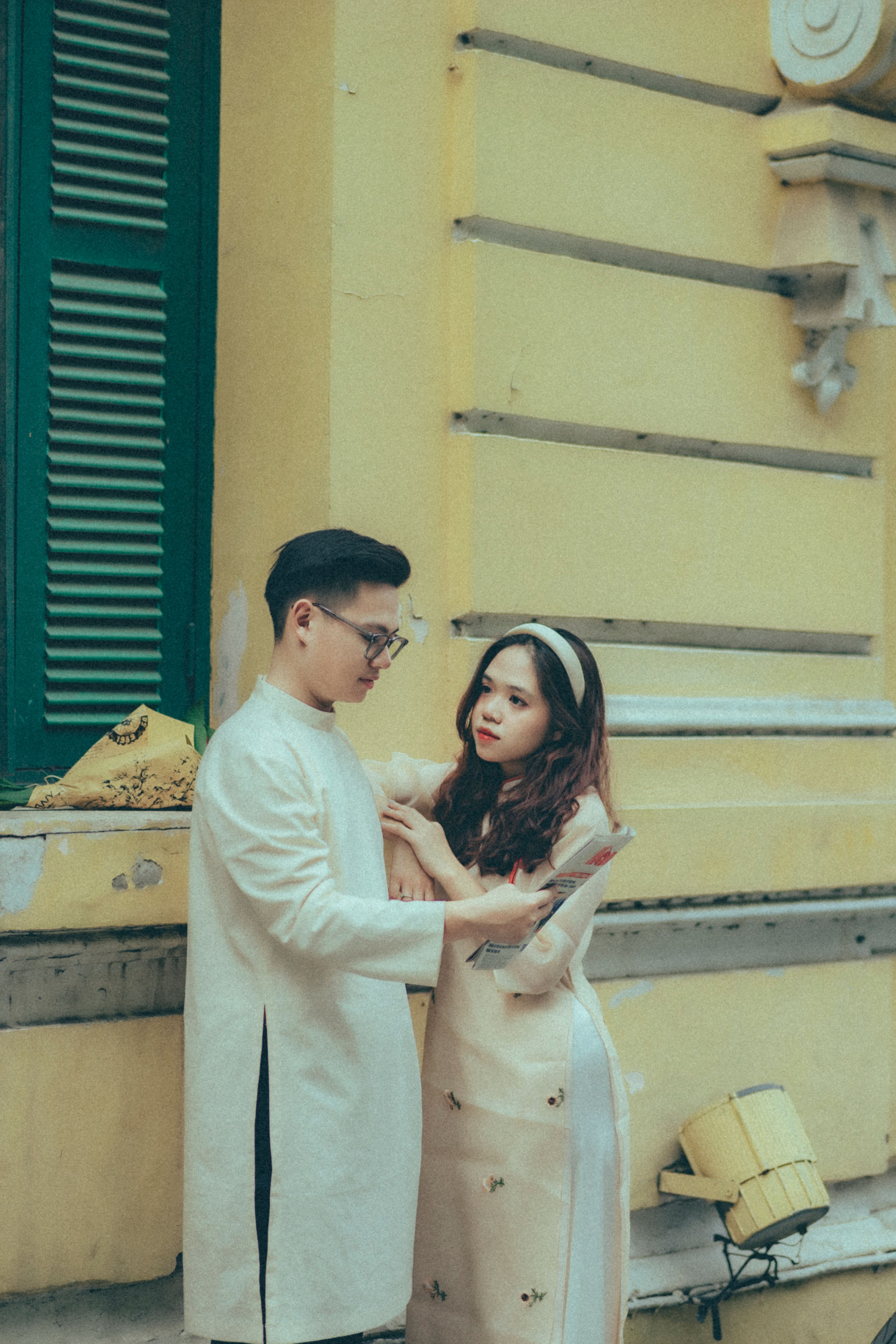 A Young Couple in Traditional Asian Clothing · Free Stock Photo