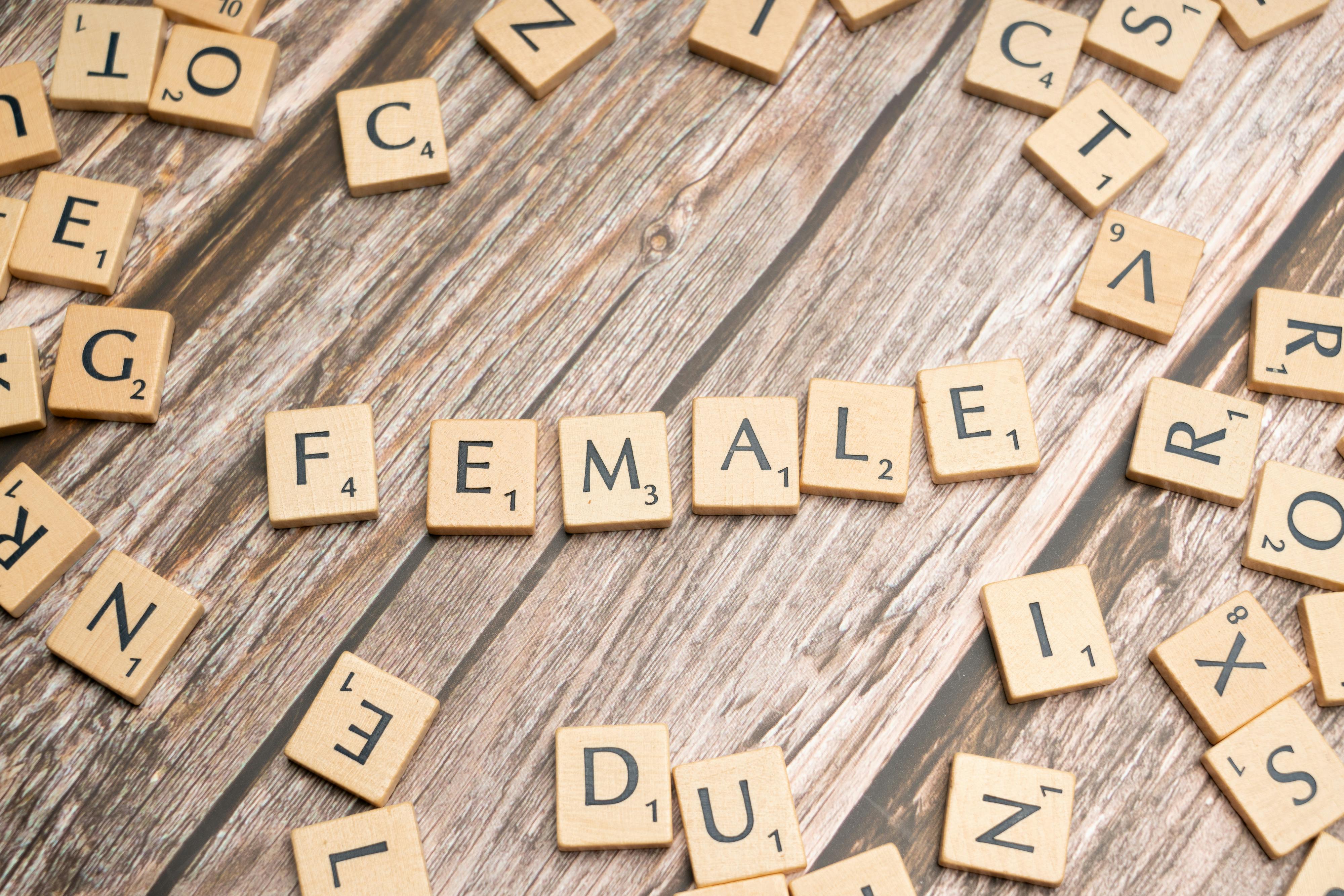 the word female spelled out with scrabble letters