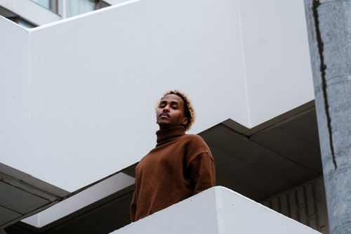 Free Contemporary urban portrait of a man in Toronto with architectural elements. Stock Photo