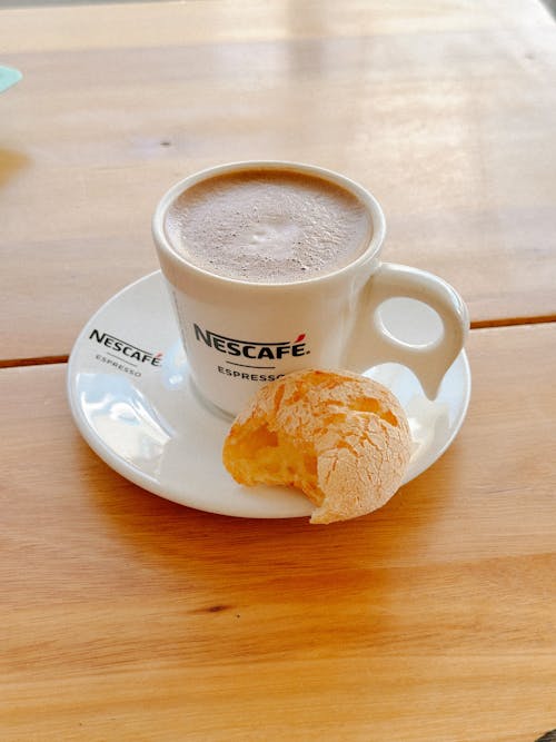 Free Cup of Coffee with Snack Stock Photo