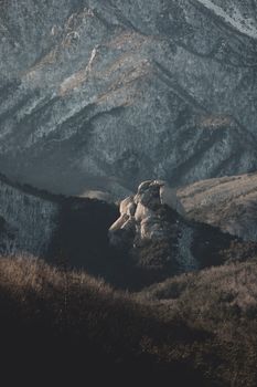 Stunning rocky mountain landscape with a scenic valley view and textured formations.