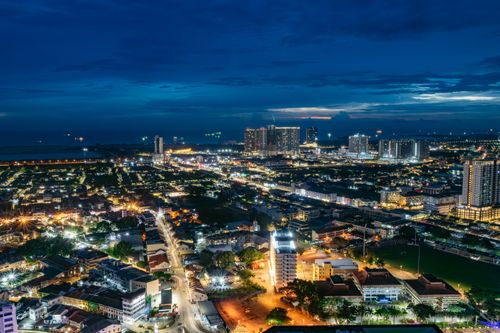Free A breathtaking aerial night view of Malacca's illuminated cityscape in Malaysia. Stock Photo