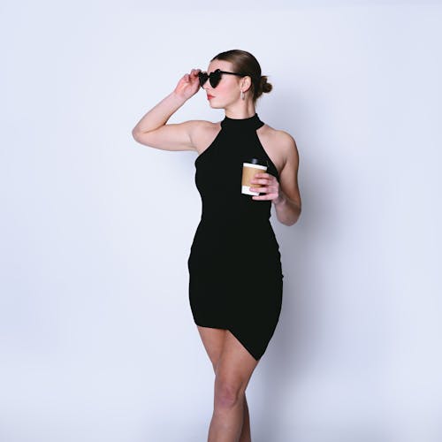 Woman in Black Dress and Sunglasses