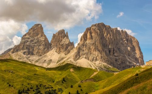 Free A breathtaking view of the towering peaks of the Dolomites against a blue sky, capturing nature's grandeur. Stock Photo