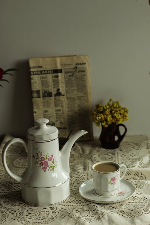 Teapot and Cup of Coffee