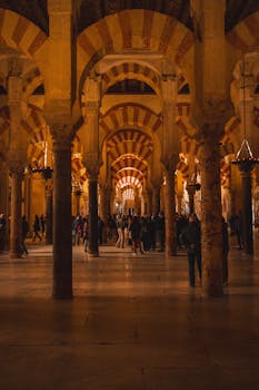 Explore the iconic arches of the Mezquita in Córdoba, a stunning architectural marvel in Spain.