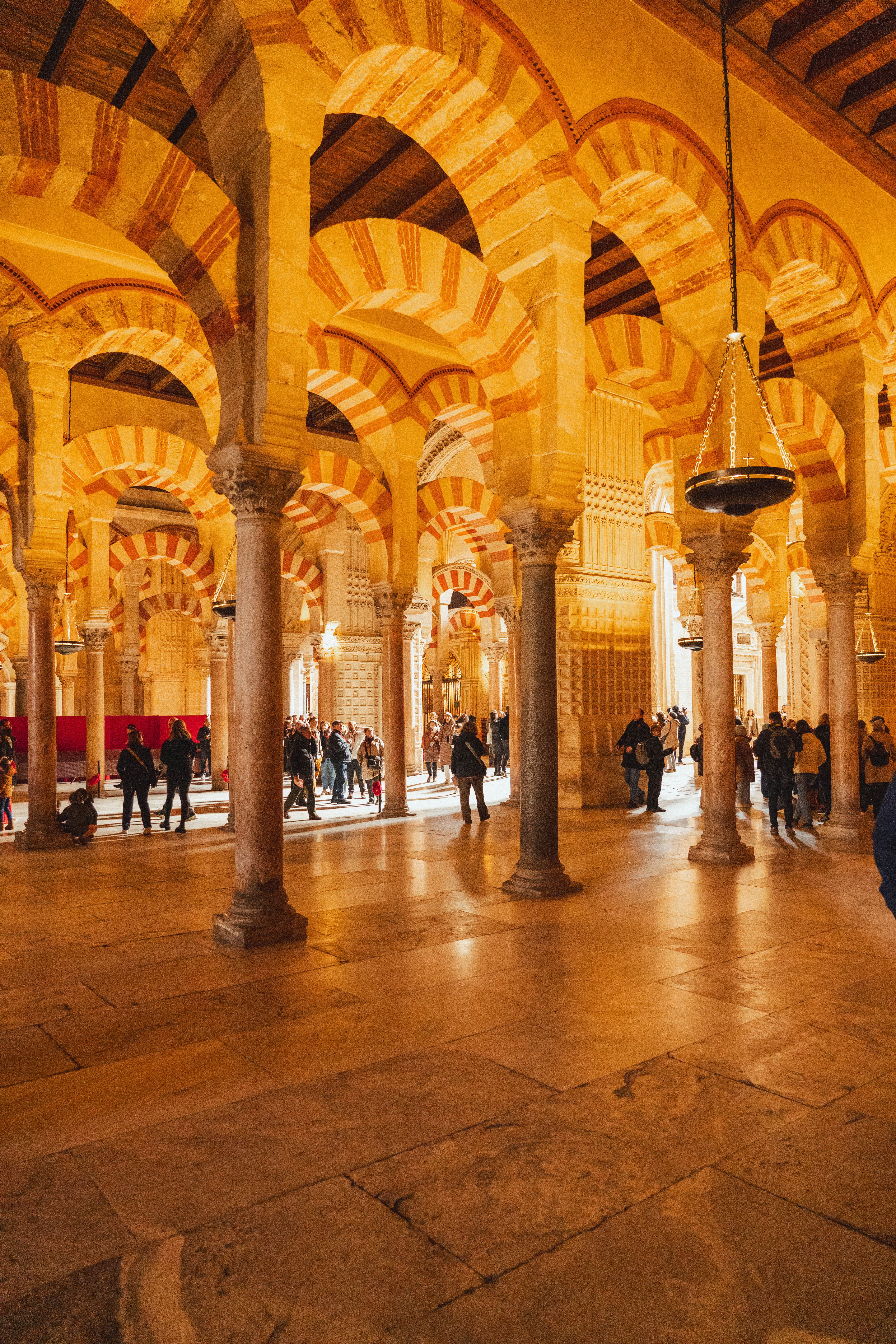 Explore the intricate arches and columns of La Mezquita in Córdoba, a stunning fusion of Islamic and Christian architecture.