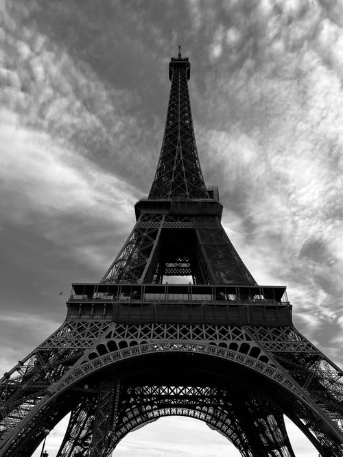 Free Iconic Eiffel Tower viewed from below in a striking black and white shot. Stock Photo