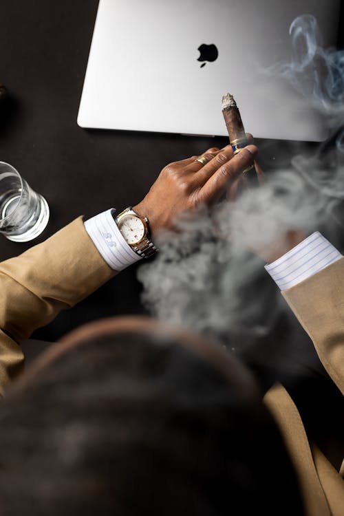 Top View of Man Smoking Cigar