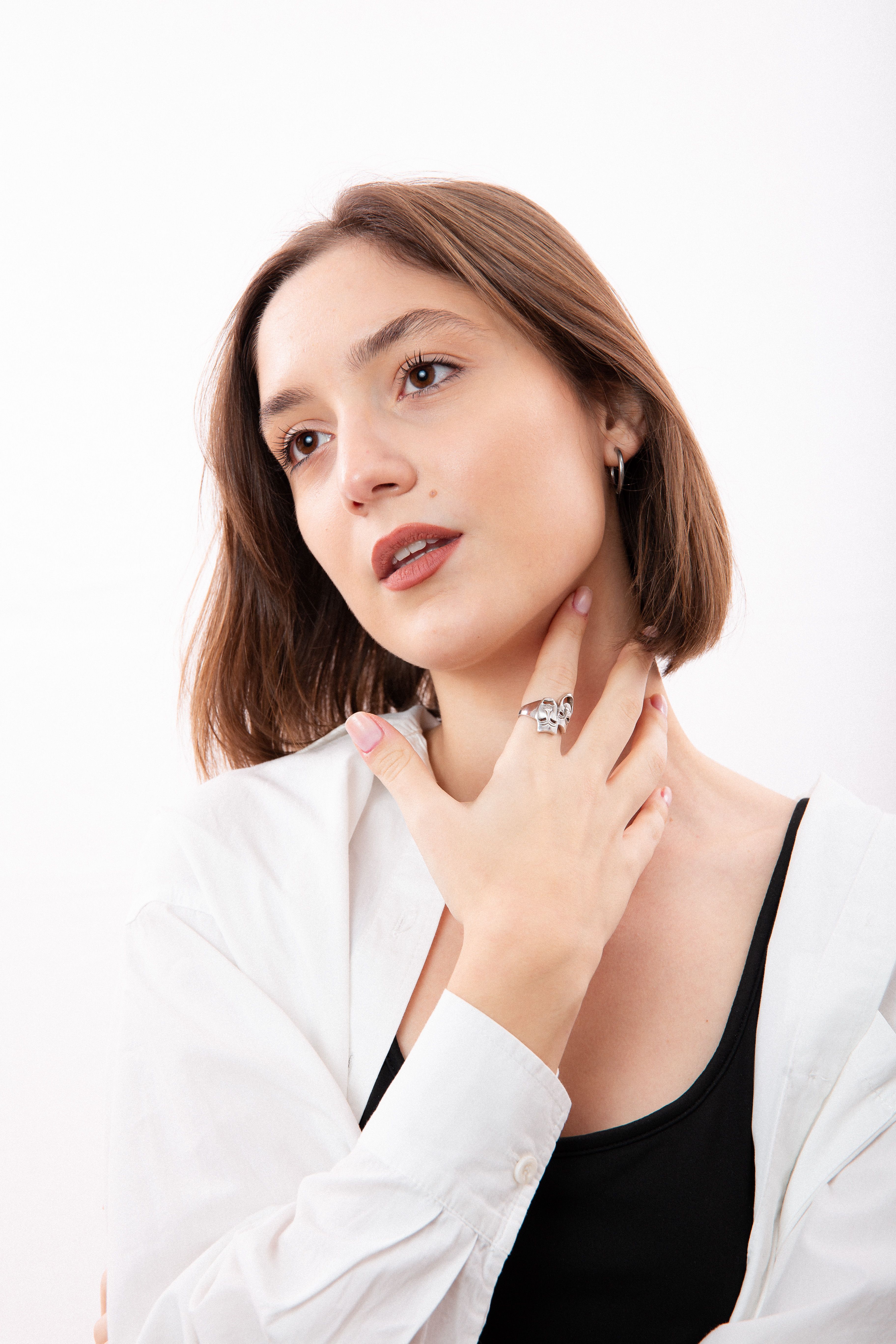 A Woman Touching her Neck · Free Stock Photo