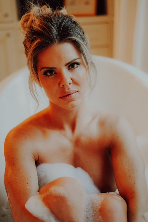 Portrait of Topless Woman in Bathtub