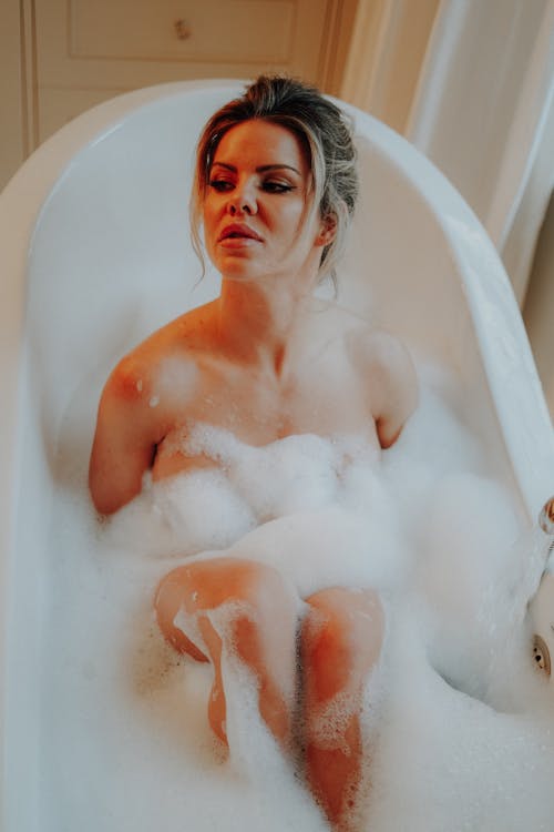 Foam on Woman in Bathtub