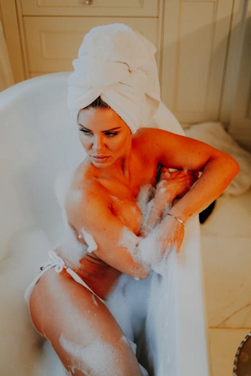 Topless Woman in Bathtub