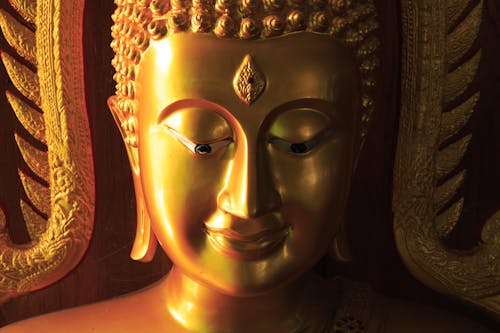 Golden Buddha Face Statue