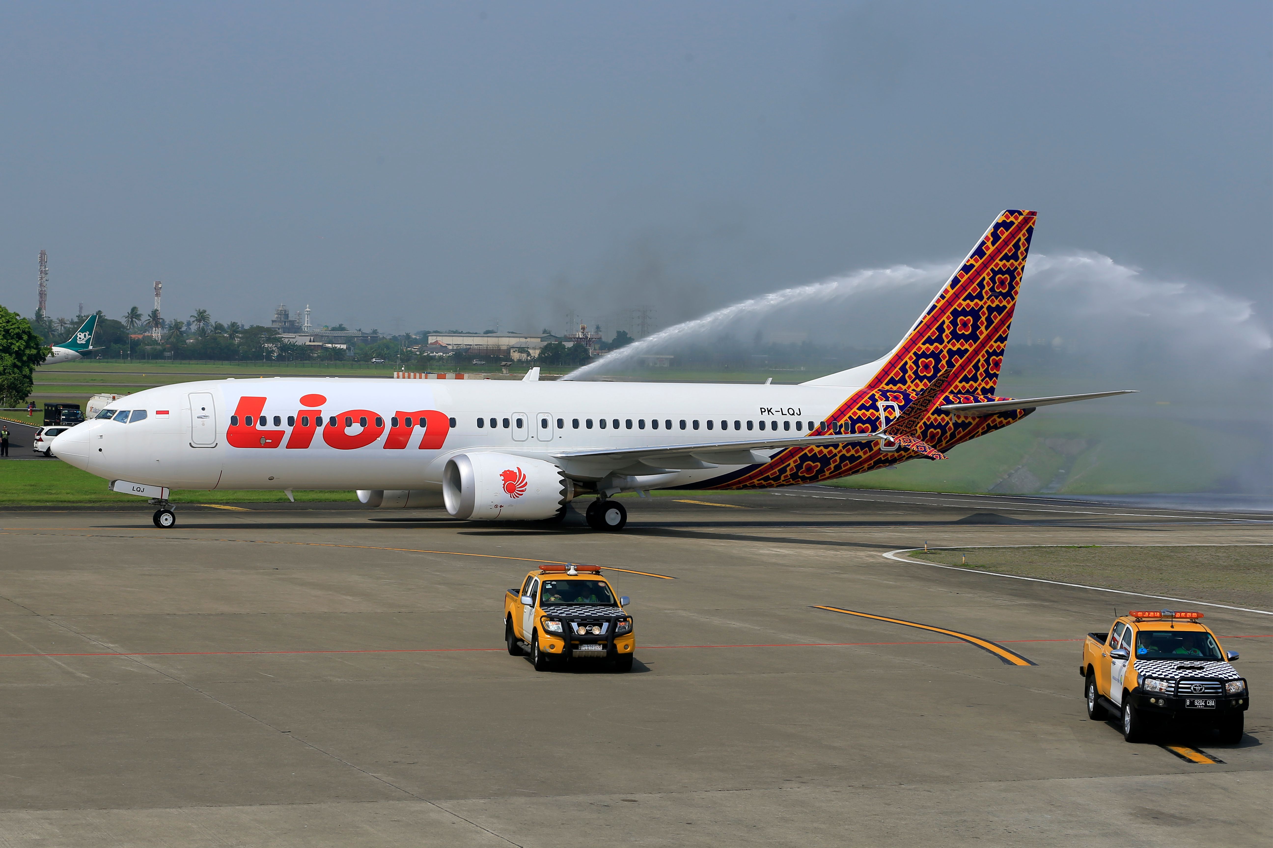 Trucks and Airplane in Airport
