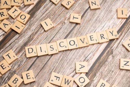 The word discovery spelled out in scrabble letters