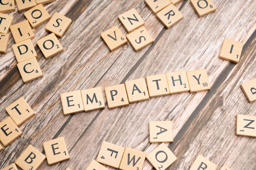 The word empathy spelled out in scrabble letters