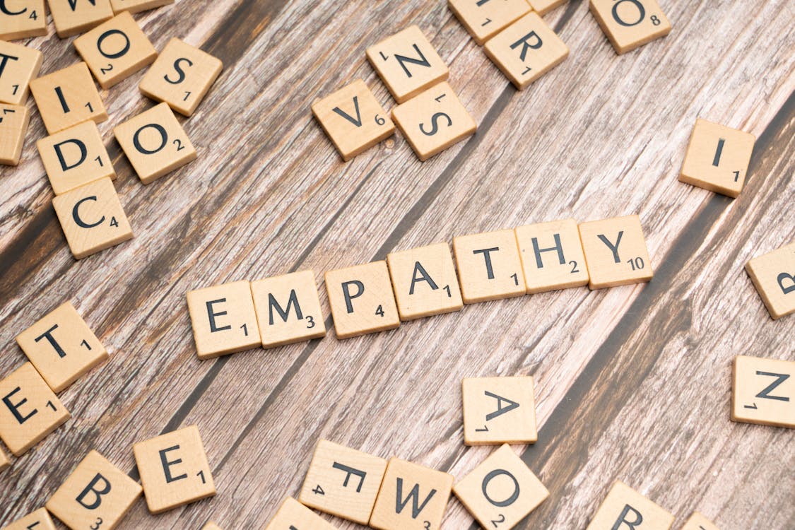 The word empathy spelled out in scrabble letters · Free Stock Photo