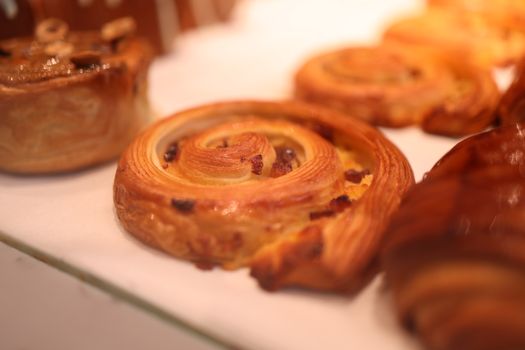 Delicious freshly baked cinnamon rolls on display, perfect for dessert lovers.