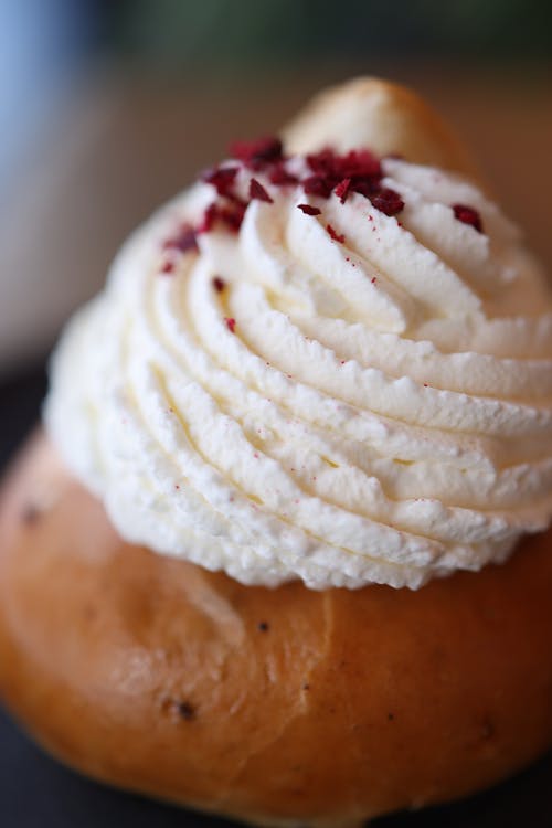 Close-up of Sweet Bun with Cream on Top