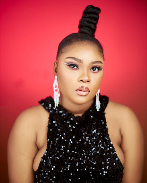 Portrait of a Female Model Wearing a Black Sequin Dress