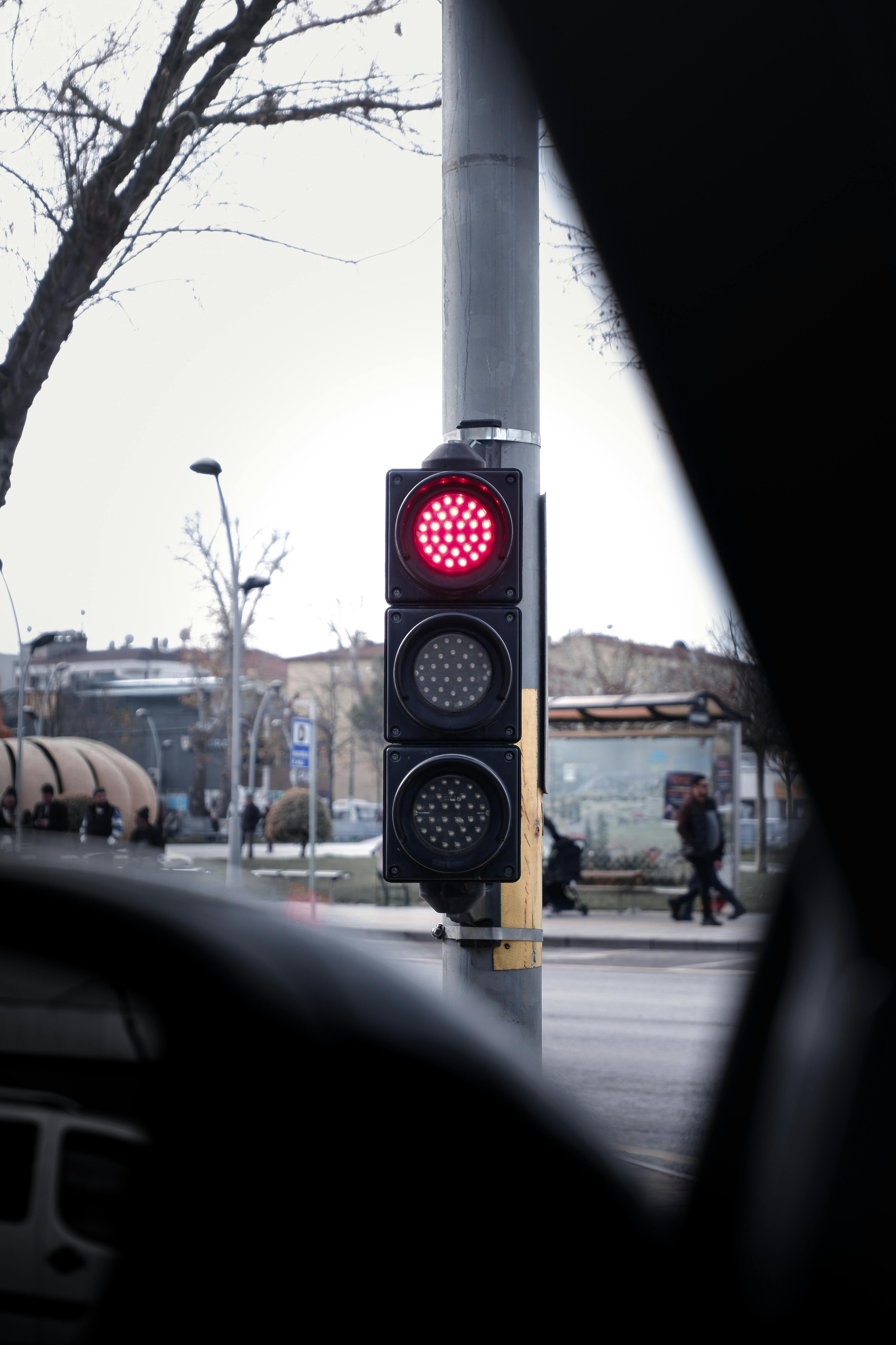 Red Traffic Light on a Street · Free Stock Photo