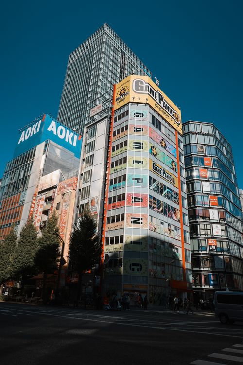 Free Vibrant city scene depicting skyscrapers and bustling streets in Taito City, Tokyo, Japan. Stock Photo