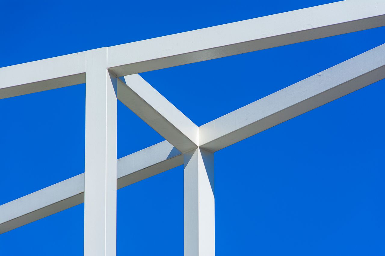 close up of a modern metal structure with clean lines against a bright