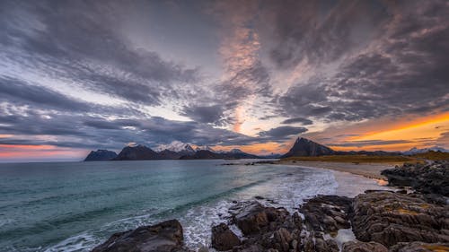 View of a Frosty Shore and Mountains at Lofoten Islands in Norway