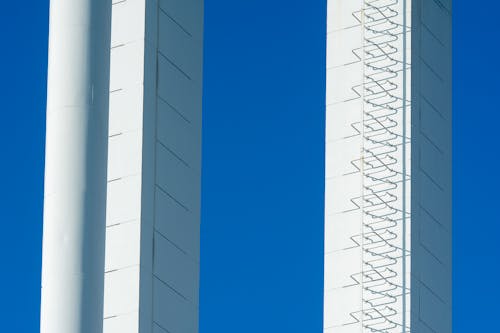 Tall White Constructions on the Background of Clear, Blue Sky