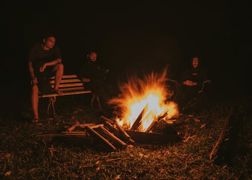 Men by Campfire at Night