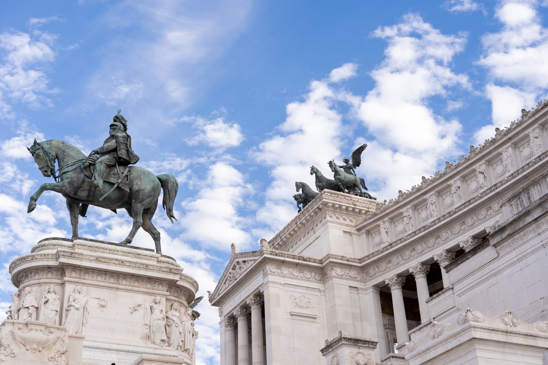 Grand view of the iconic Victor Emmanuel II Monument in Rome, under a vibrant sky.