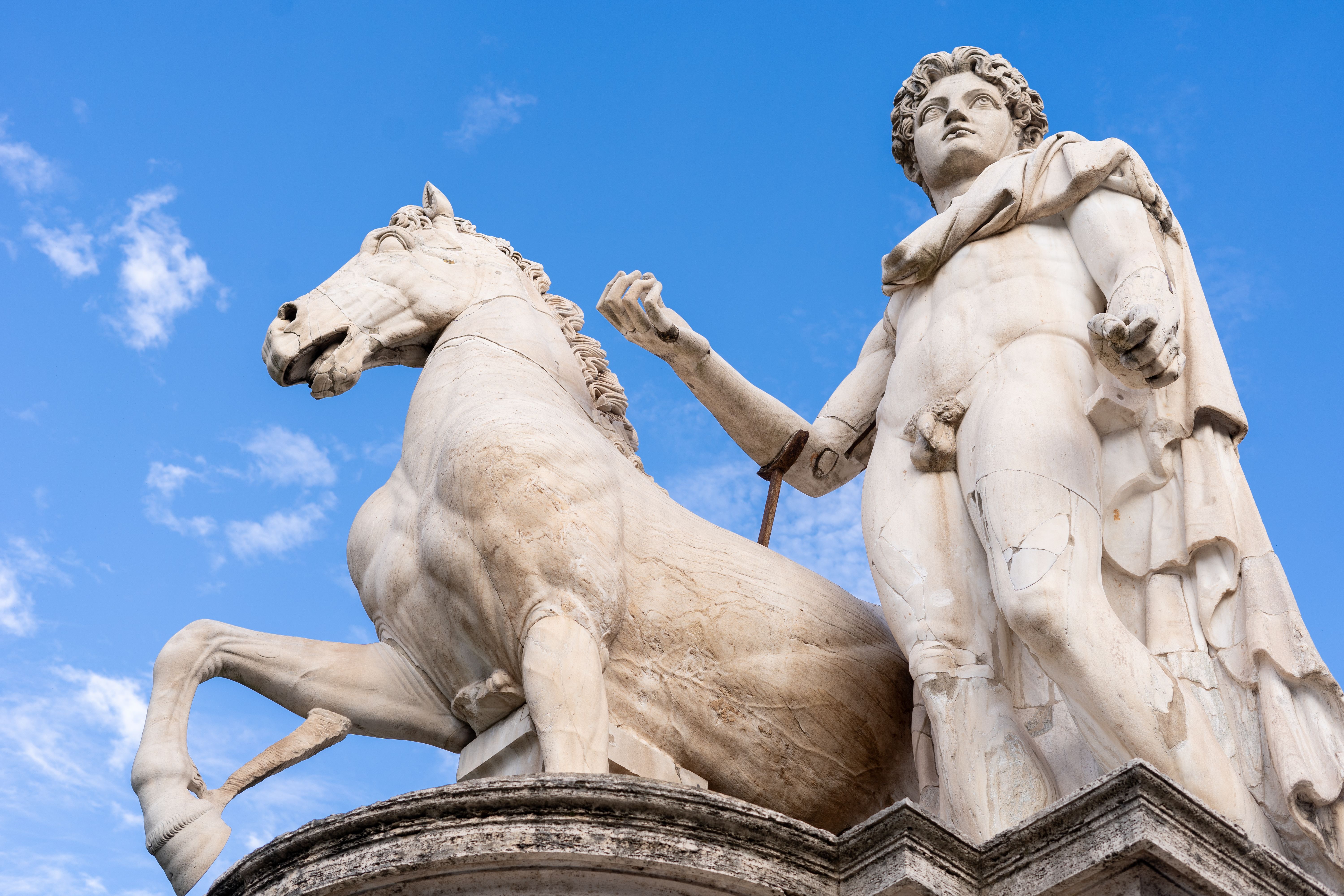 Roman Statue of Horse and Rider Against Blue Sky · Free Stock Photo