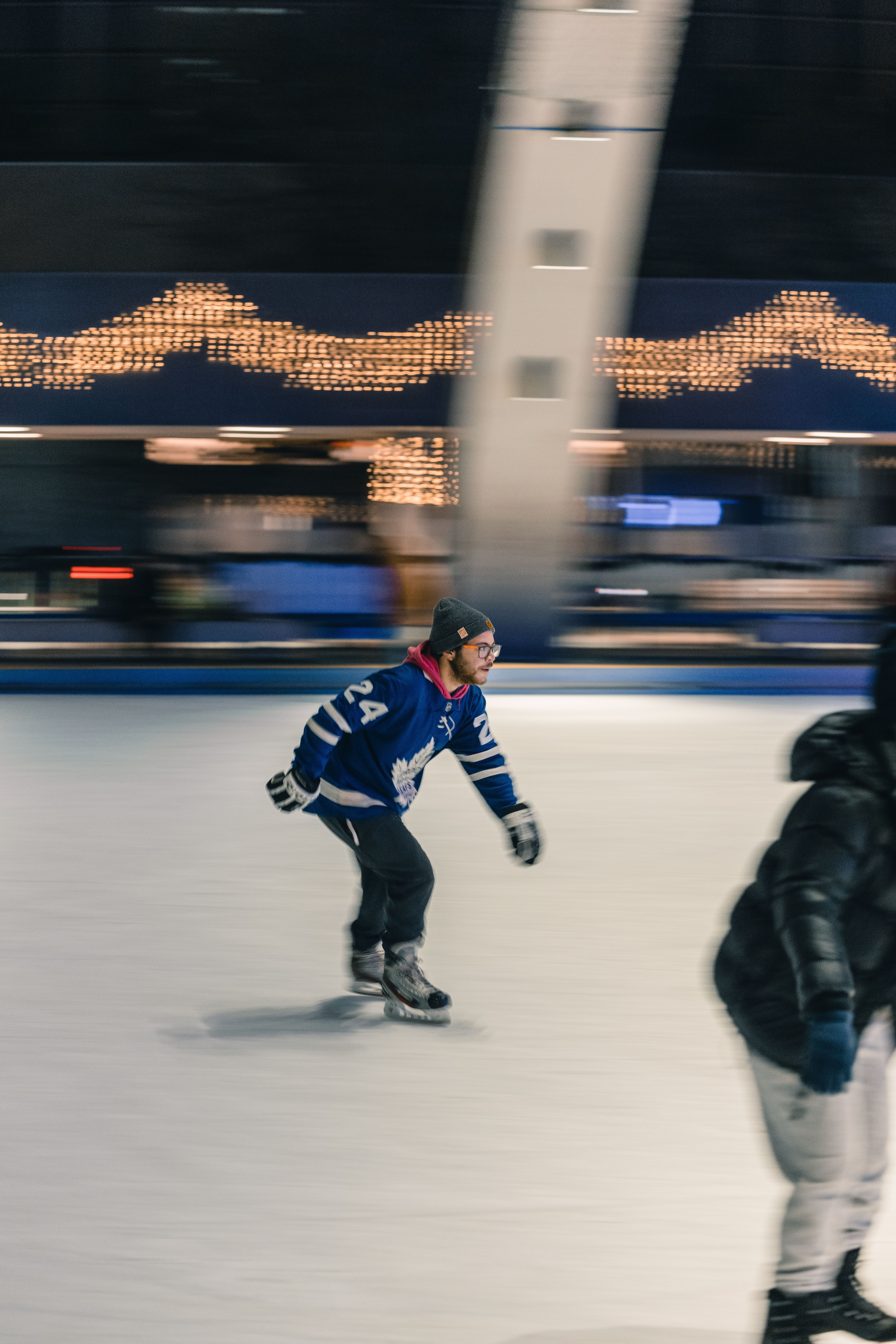 Man Skating on Ice Rink at Night · Free Stock Photo